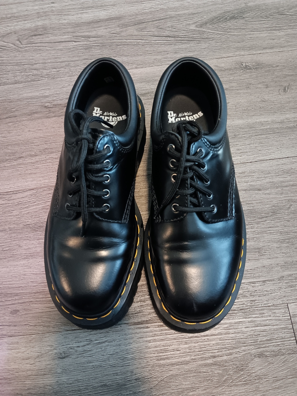 Dr. Martens Black Leather Low-Top Platform Oxfords with Yellow Stitching